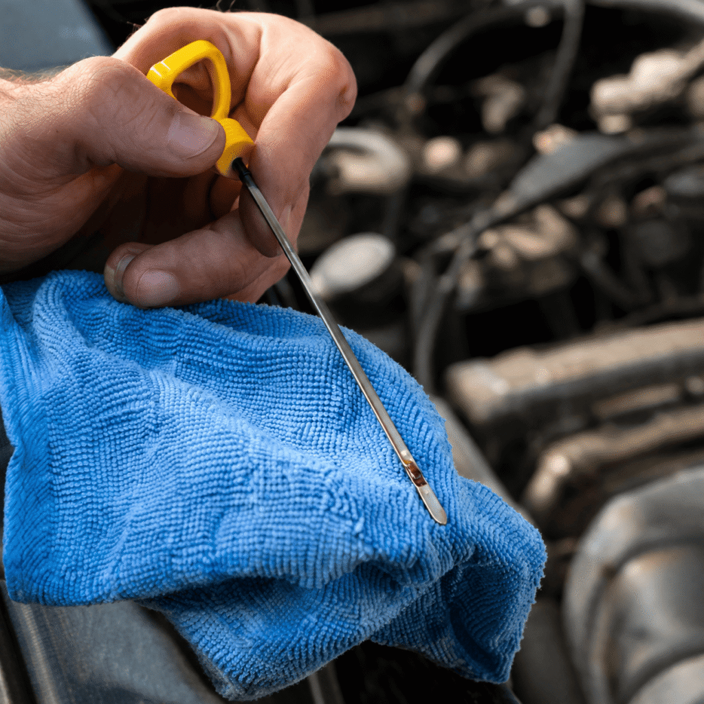 How to Check the Oil Level in Your Car — locating the dipstick
